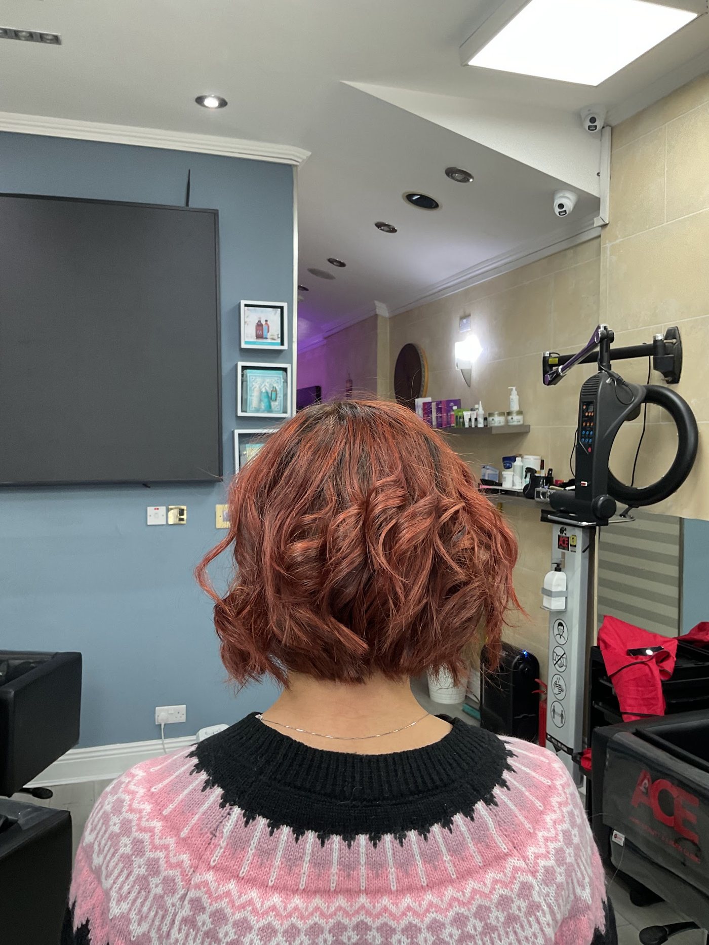 Copper curly bob